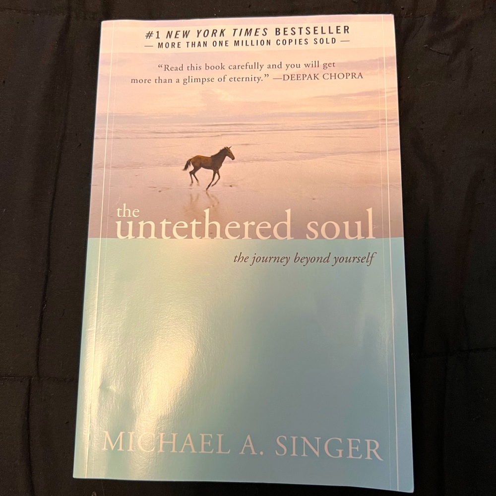 Michael A. Singer… The Untethered Soul.  Soft cover, excellent condition